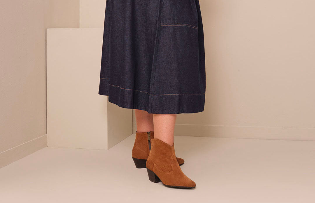 How to Style Boots with Skirts and Dresses