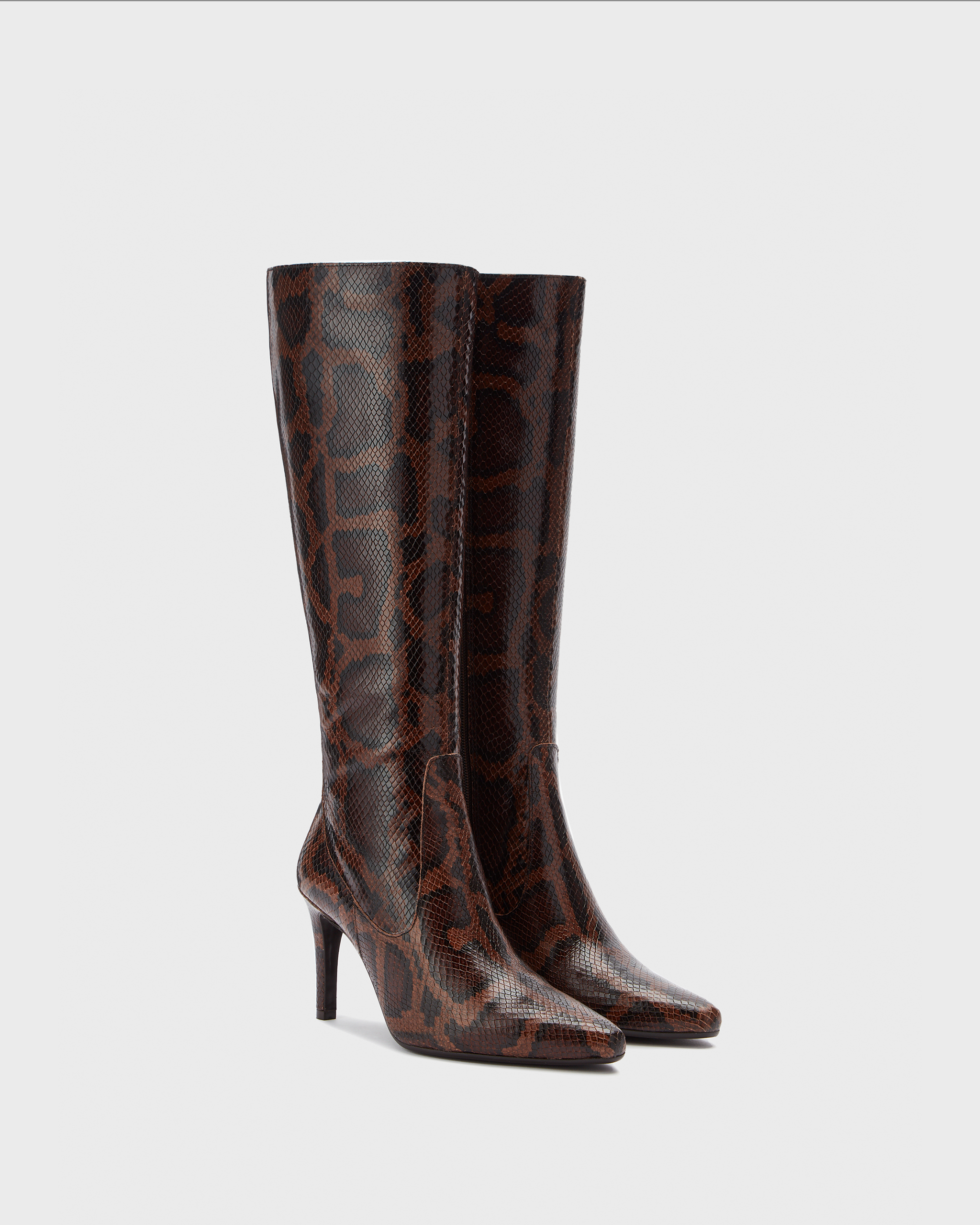 knee high snake stiletto heeled boots