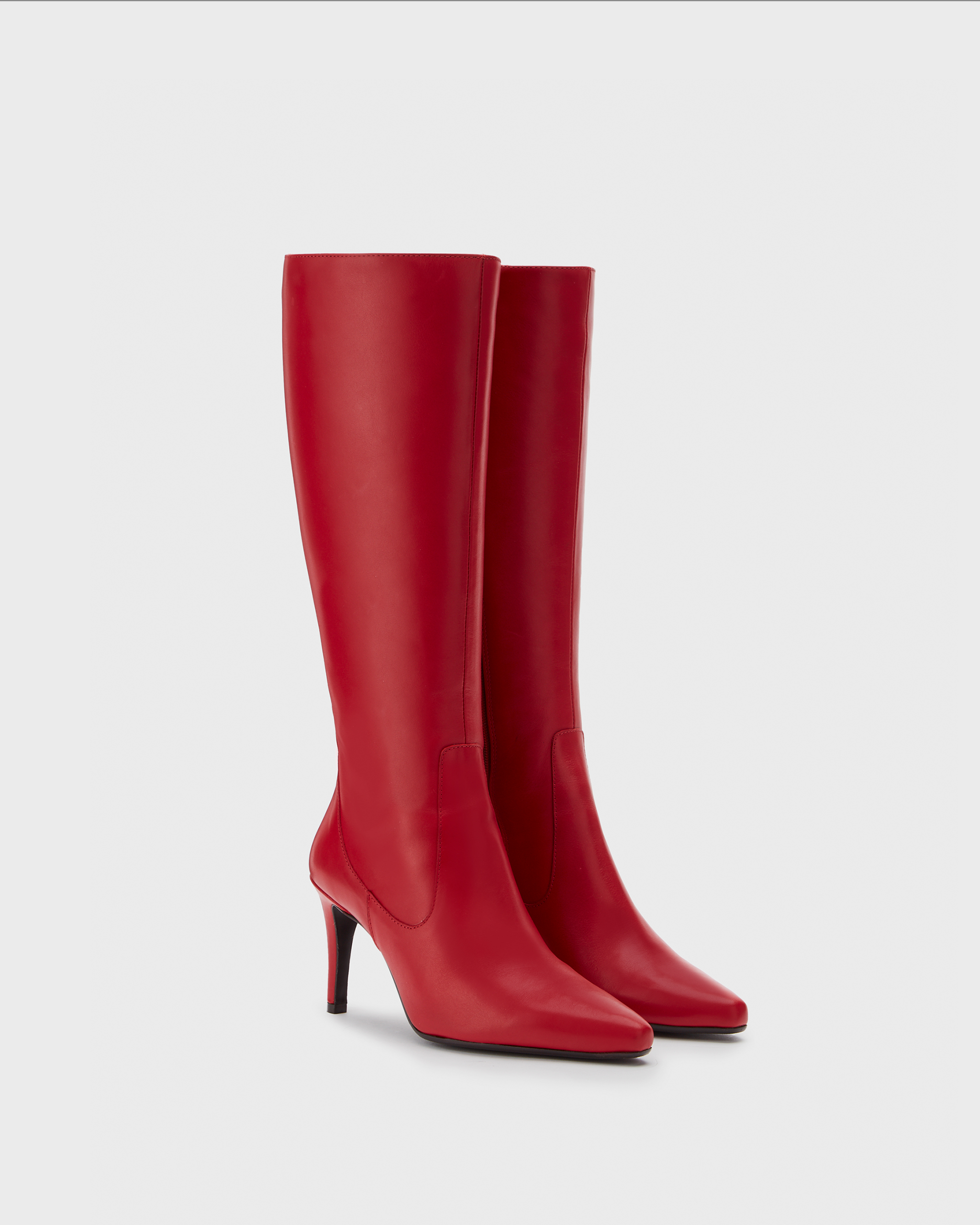 knee high red stiletto heeled boots