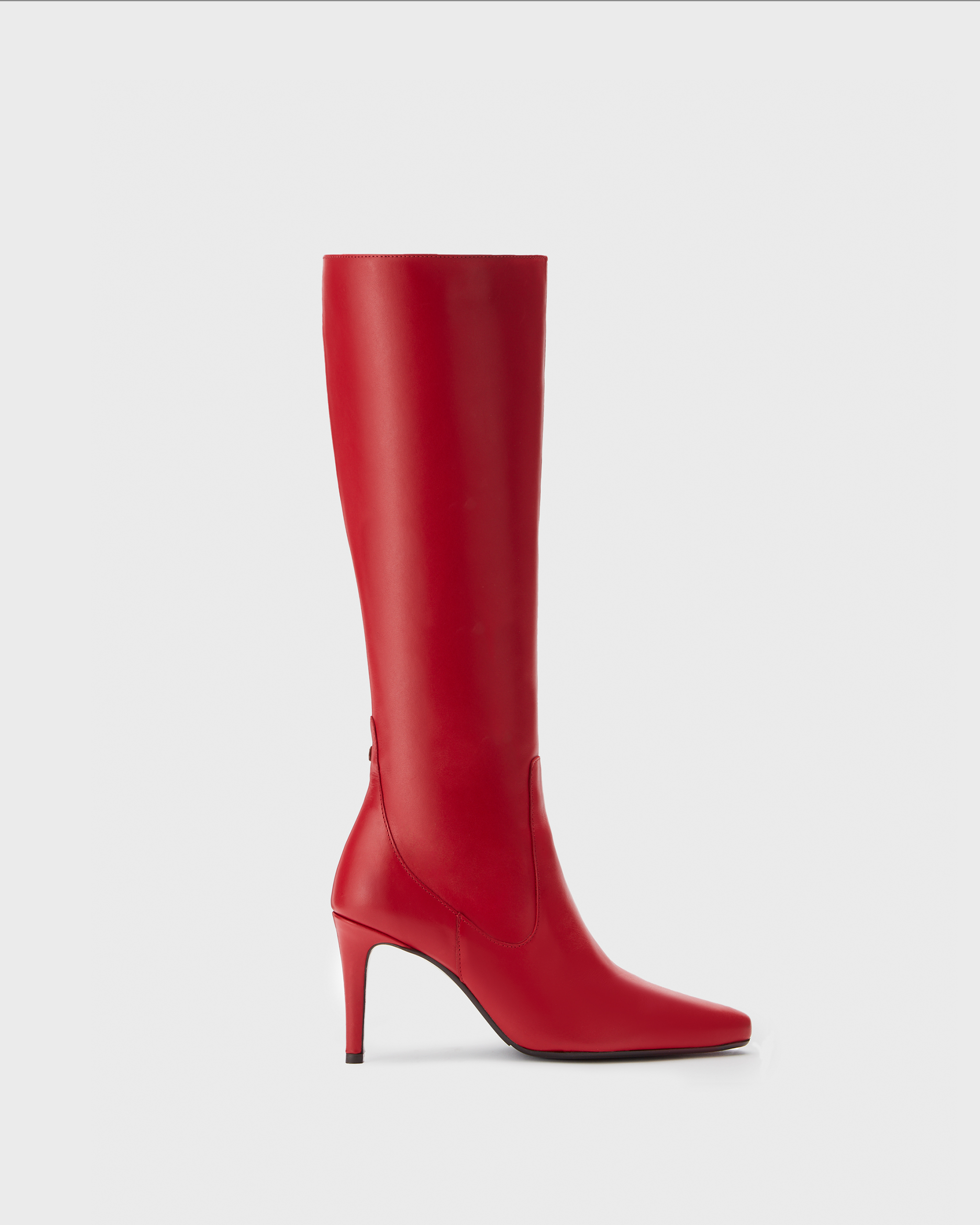 knee high red stiletto heeled boots