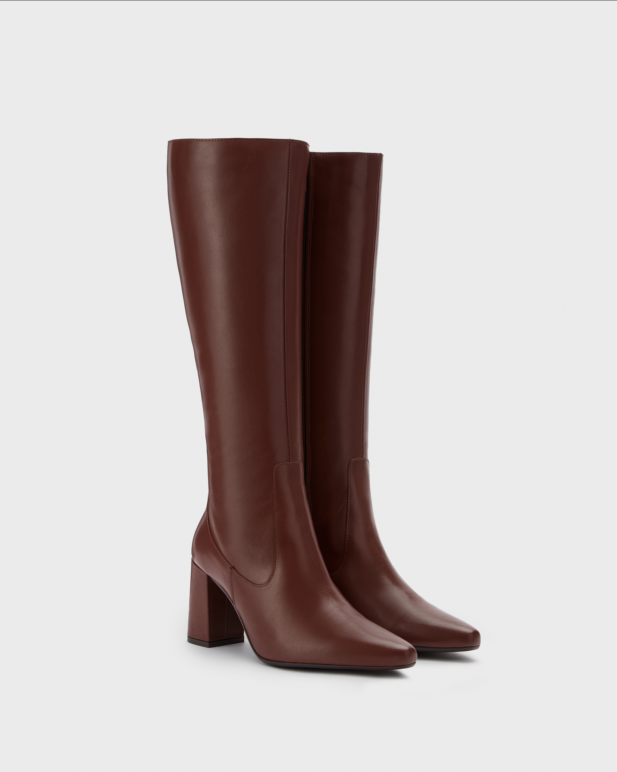 Knee high pointed brown block heeled boot