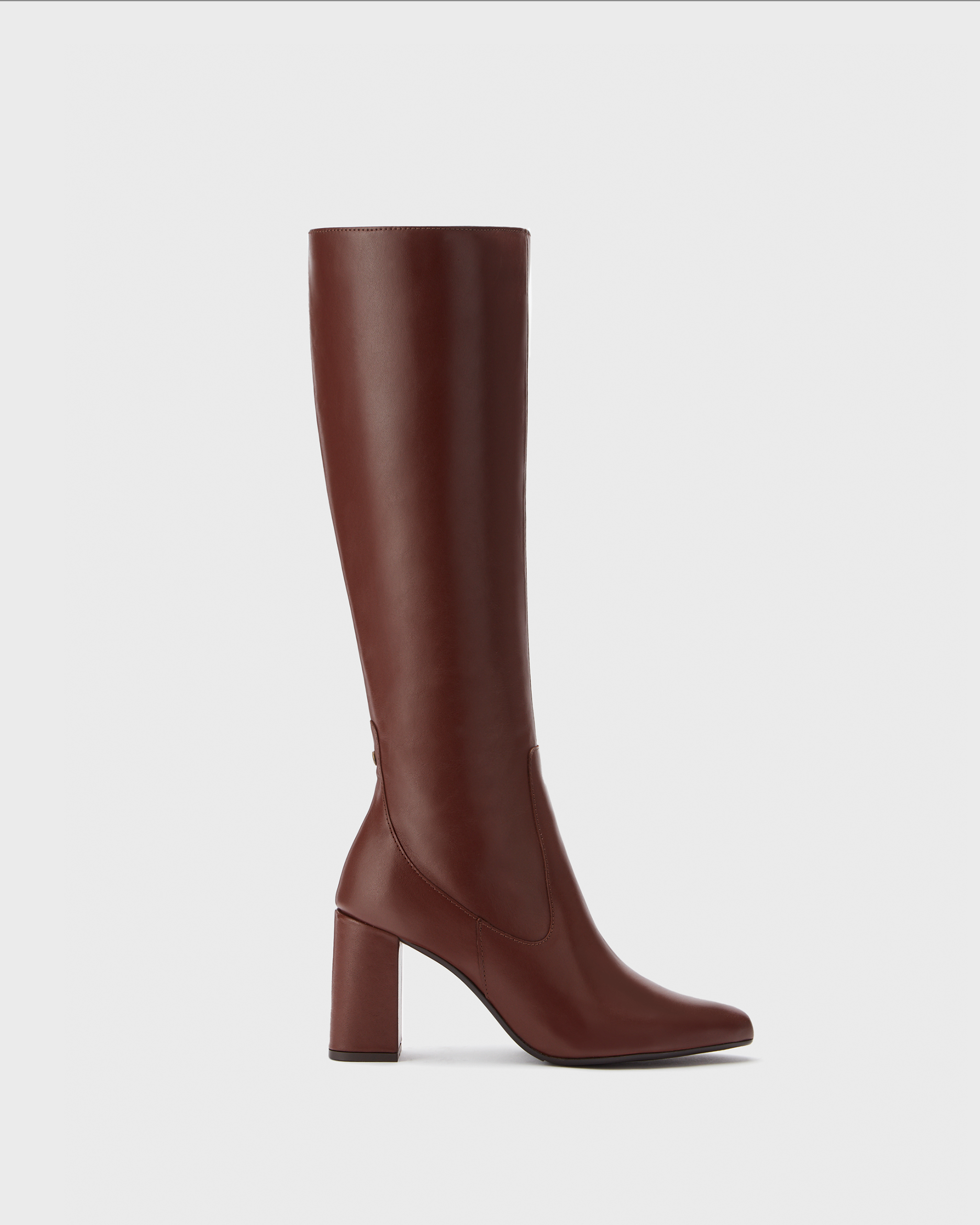 Knee high pointed brown block heeled boot